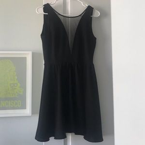 Skater dress, with mesh deep v neckline.